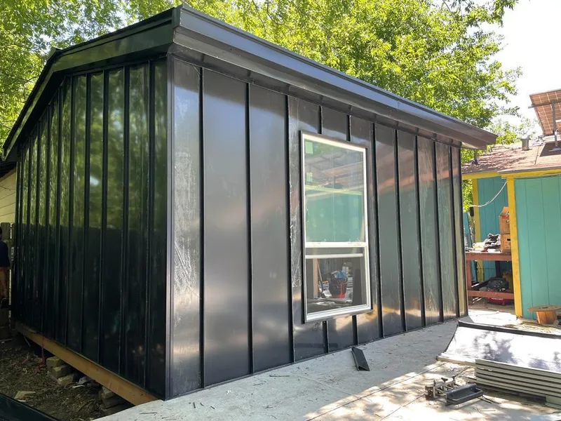 Black standing seam metal wall panels for Metal Roof Installation in Amityville